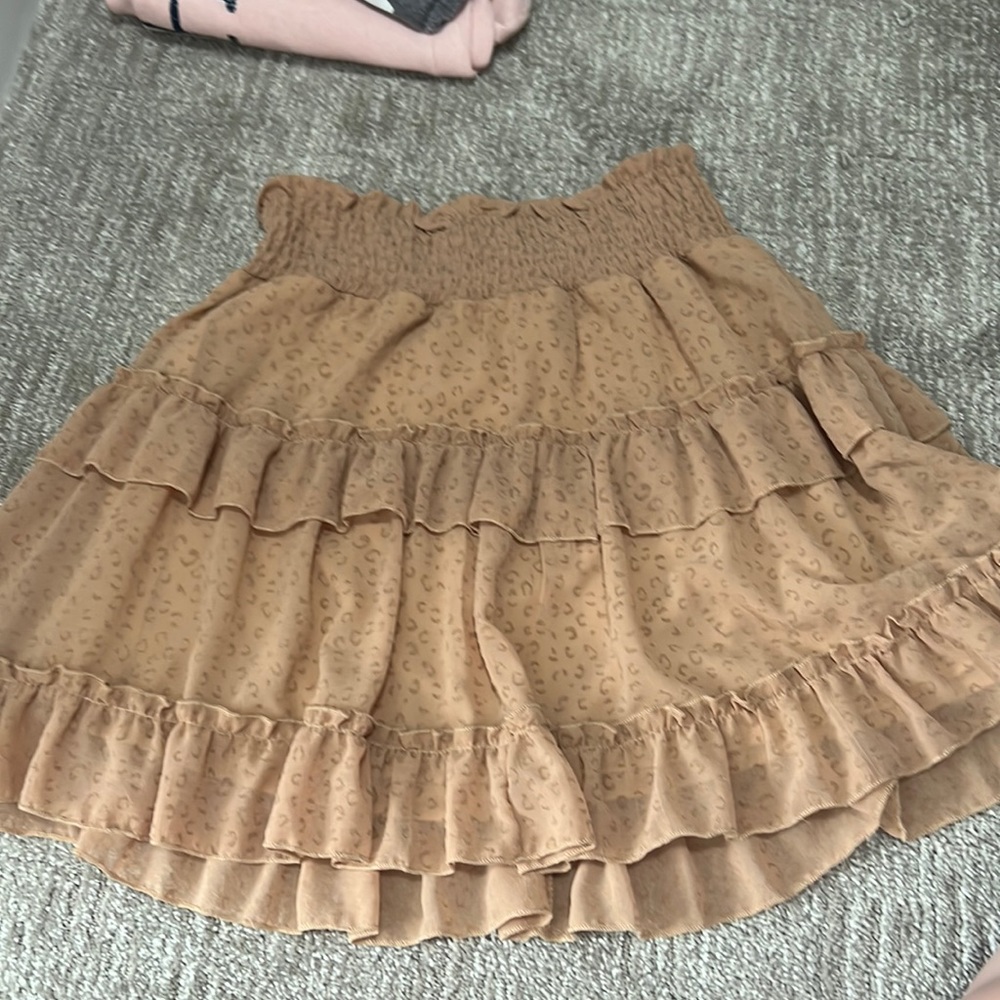 Size small tan with cheetah print
